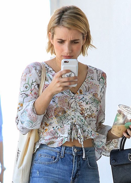 Emma Roberts on phone