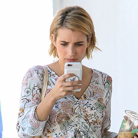 Emma Roberts on phone