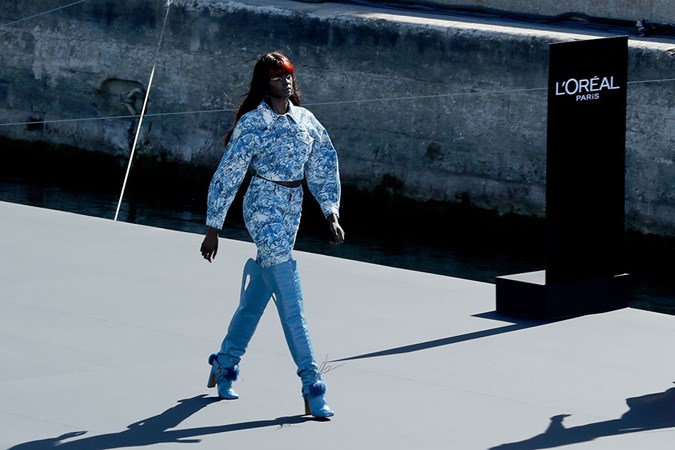 Duckie Thot walking for L'Oréal Paris at Paris Fashion Week