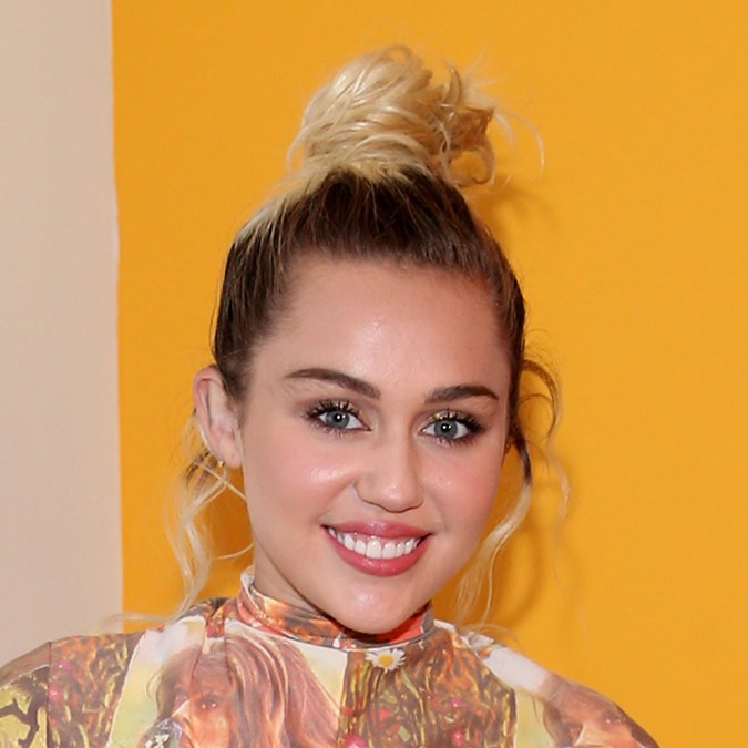 Miley Cyrus messy topknot