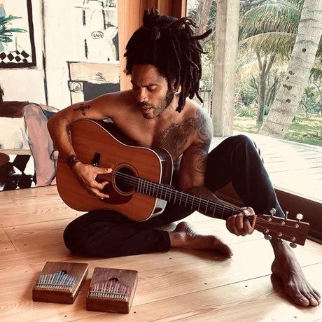 Lenny Kravitz exfoliates using sand from his private island.